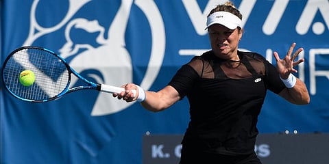 Kim Clijsters hits a forehand against Su-Wei Hsieh during her first round match in the Chicago Fall Tennis Classic tournament in Chicago. (Photo | AP)