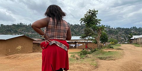 File: In this Thursday, March 18, 2021 file photo, Shekinah stands near her home in Beni, eastern Congo. (Photo | AP)