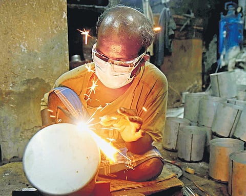 File photo of a worker at a small-scale industry