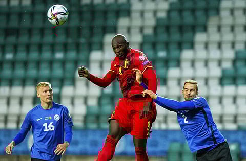 Belgium's Romelu Lukaku, centre, fights for the ball with Estonia players during World Cup 2022 qualifying at the A. Le Coq Arena in Tallinn, Estonia, Thursday. (Photo | AP)