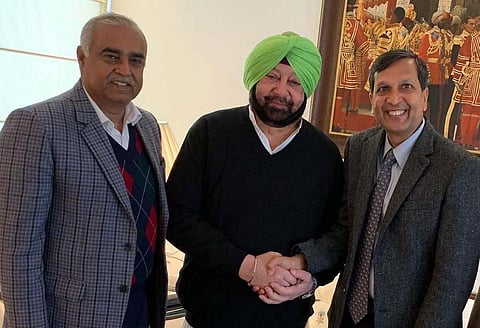 Dinkar Gupta (R) with Punjab CM Captain Amarinder Singh and outgoing DGP Suresh Arora. (Photo | Special Arrangement)
