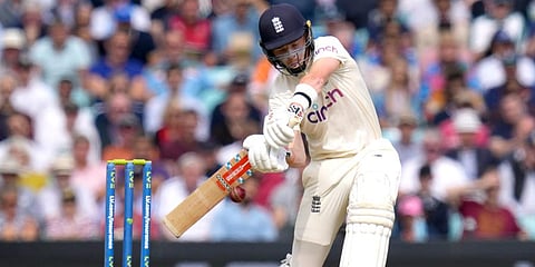 England's Ollie Pope plays a shot off the bowling of India's Shardul Thakur on day two of the fourth Test match at The Oval cricket ground in London. (Photo | AP)