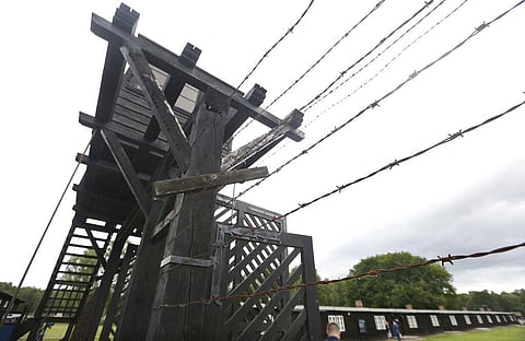The wooden main gate leads into the former Nazi German Stutthof concentration camp in Sztutowo, Poland. (File Photo | AP)