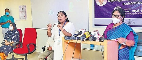 A sign language expert interprets Social Justice Minister R Bindu’s speech during the release of the first sign language alphabet in Malayalam | Express