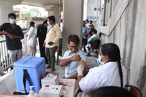 Citizens take Covid vaccine during special vaccination drive in Vijayawada on Friday. (Photo | Prashant Madugula, EPS)
