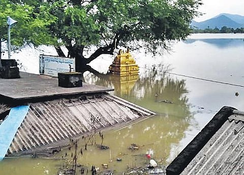 A view of the submerged Gandi Pochamma temple in Devipatnam mandal of East Godavari district in the backwater of Polavaram project | Express