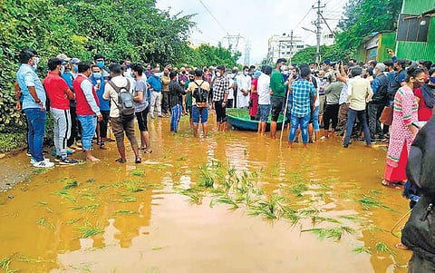 Residents took coracle rides and planted paddy along the stretch. (Photo| EPS)