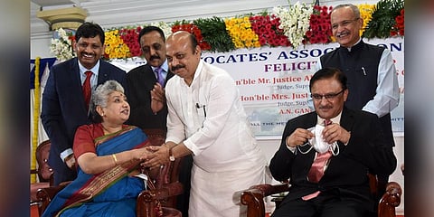 CM Basavaraj Bommai greets Justices BV Nagarathna and Abhay Shreeniwas Oka in Bengaluru. (Photo| Vinod Kumar T, EPS)