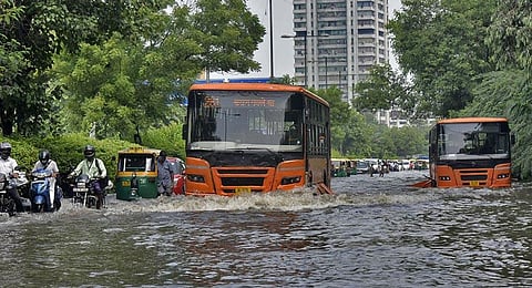 Vehicles ply on a waterlogged stretch near Ring Road, Delhi on Friday. (Photo | Parveen Negi, EPS)