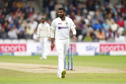 India's Jasprit Bumrah walks to his bowling mark. (Photo | AP)