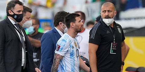 Argentina's Lionel Messi walks off the field after the qualifying soccer match for the FIFA World Cup Qatar 2022 against Brazil was interrupted by health officials in Sao Paulo. (Photo | AP)