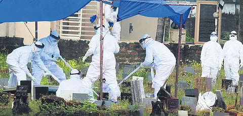 The body of the 12-year-old boy who died of Nipah being laid to rest at Kannamparambu burial ground in Kozhikode. (Photo | Express)