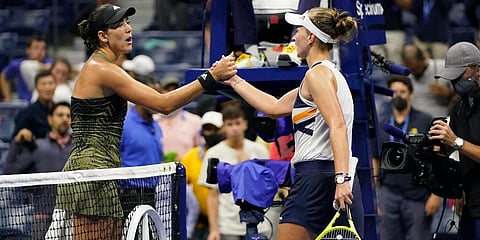 Garbine Muguruza, of Spain, left, shakes hands with Barbora Krejcikova, of the Czech Republic, after Krejcikova won during the fourth round of the US Open tennis championships, Sept. 5 2021. (AP)