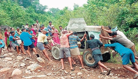 Tribals take a concrete mixer to their hilltop village Vanakabadi in Vizianagaram district | EXPRESS