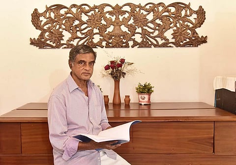 Babu Valavi going through the documents at his home in Kochi | Albin Mathew