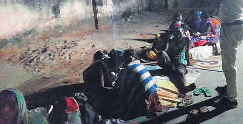 Villagers waiting outside Kutra CHC in the night to get vaccinated. (Photo | Express)