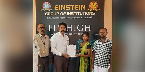Secretary of Einstein College of Arts and Science Ezhilvanan handing over admission order to Vijayalakshmi. (Photo | Express)