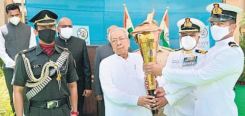 Governer Biswabhusan Harichandan receiving the Victory Flame, at Raj Bhavan in Vijayawada on Wednesday, September 8, 2021. (Photo | Express)