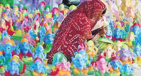 Artisans giving finishing touches to Vinayakar idols at Villianur in Puducherry and Katpadi in Vellore | PATTABI RAMAN/ S dinesh