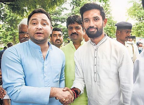 RJD leader Tejashwi Yadav with LJP leader Chirag Paswan. (File Photo | PTI)