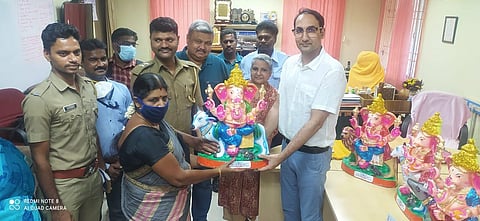 The Vinayaka idols made by convicts being handed over to buyers by Inspector General of Prisons Ravideep Singh Chahar on Thursday (Photo | Special arrangement)