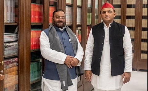 Swami Prasad Maurya along with SP chief Akhilesh Yadav. (Photo | Twitter)