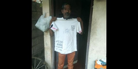 Anwar with the signed T-shirt