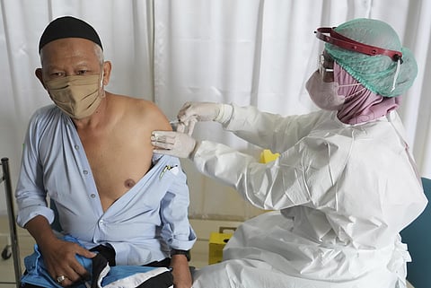 Indonesia kicked off a COVID-19 booster vaccine campaign for the general public on Wednesday, prioritizing third shots for the elderly and people with compromised immune systems. (Photo | AP)