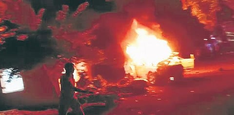 A mob set ablaze a four-wheeler and three motorcycles parked on the Atmakur police station premises on Saturday late night, Jan 8, 2022. (Photo I Express)