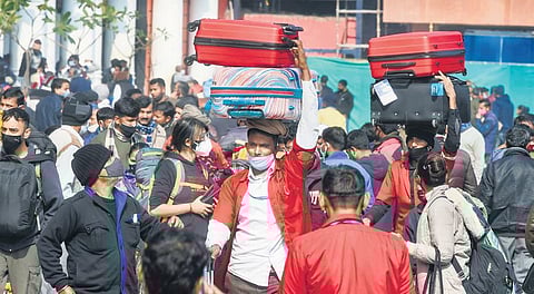Crowd of passengers at New Delhi Railway Station amid Covid-19 even as cases increase. (Photo | PTI)