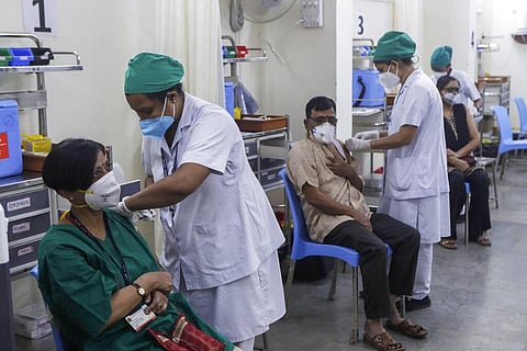 Indian health workers receive third dose of vaccination for COVID-19 at a vaccination center in Mumbai, India, Monday, Jan. 10, 2022. (Photo | AP)
