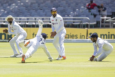 Indian wicketkeeper Rishabh Pant and Cheteshwar Pujara dive for the ball while KL Rahul and captain Virat Kohli look on during the second day of the third and final test match. (Photo | PTI)
