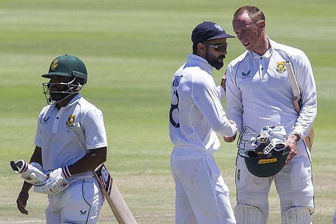 Indian captain Virat Kohli, center, congratulates Rassie van Der Dussen oafter South Africa beat India 2-1 in a test series between in Cape Town. (Photo | AP)
