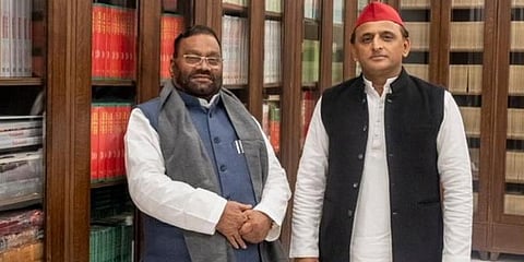 Former Uttar Pradesh Minister Swami Prasad Maurya along with SP chief Akhilesh Yadav (Photo | Twitter)