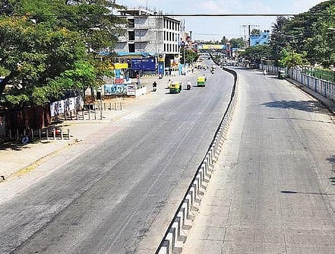 Mysuru road wore a deserted look with very few people venturing out | Express
