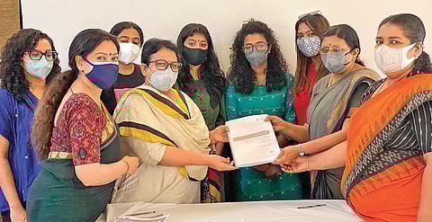 WCC members handing over a copy of their recommendations to be included in the cinema policy to Kerala Women’s Commission chairperson P Sathidevi in Kozhikode. (Photo| EPS)