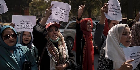 Afghan women march to demand their rights under the Taliban rule during a demonstration near the former Women's Affairs Ministry building in Kabul. (File photo| AP)