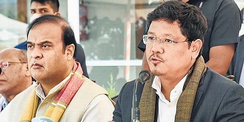 Assam CM Himanta Biswa Sarma (left) and his Meghalaya counterpart Conrad Sangma (Photo | PTI)