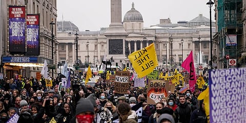 Protesters march during the 'Kill the Bill' march on the national day of action in London, Saturday, Jan. 15, 2022. (Photo | AP)