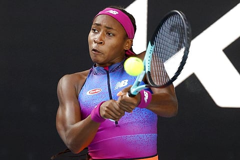 Coco Gauff of the U.S. plays a backhand return to Wang Qiang of China during their first round match at the Australian Open tennis championships in Melbourne. (Photo | AP)