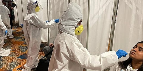 Nasal Swabs being collected from flyers for Covid RT-PCR tests at Kempegowda International Airport, Bengaluru. (Photo | Twitter, @BLRAirport)