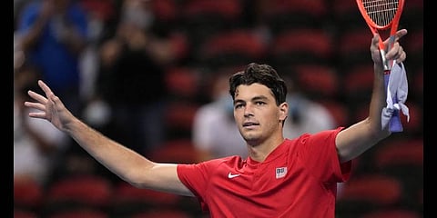 United States' Taylor Fritz waves after his win over Canada's Felix Auger-Aliassime in their match at the ATP Cup tennis tournament in Sydney, (Photo | AP)
