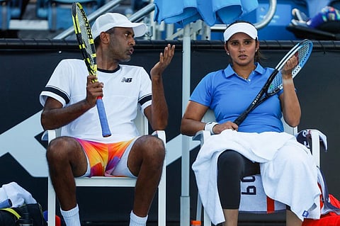 Sania Mirza listens to partner Rajeev Ram of the US during their mixed doubles match against Serbia's Aleksandra Krunic and Nikola Cacic on day four of the Australian Open tournament. (Photo | AFP)