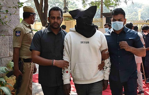 Telangana police produce Nigerian drug pedlar Tony before the media in Hyderabad on Thursday. (Photo | R V K Rao, EPS)