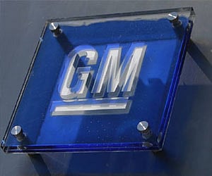 The General Motors logo is seen outside its headquarters at the Renaissance Centre in Detroit, Michigan August 25, 2009. (Photo | Reuters)