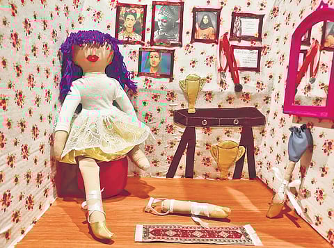A doll with a prosthetic limb (above) and icons such as Frida Kahlo, Kalpana Chawla, Phoolan Devi and Maya Angelou