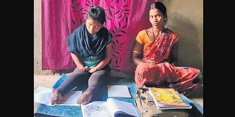 Jasoda Dalai with her mother Nila Dalai at Charamula village in Koraput. (Photo | EPS)