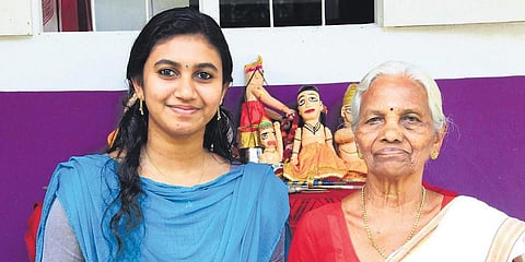 KS Renjini (L) with grandmother and ace puppeteer Moozhikkal Pankajakshi. (Photo| EPS)