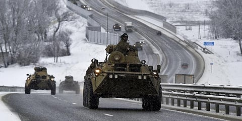 A convoy of Russian armored vehicles moves along a highway in Crimea.(Photo | AP)