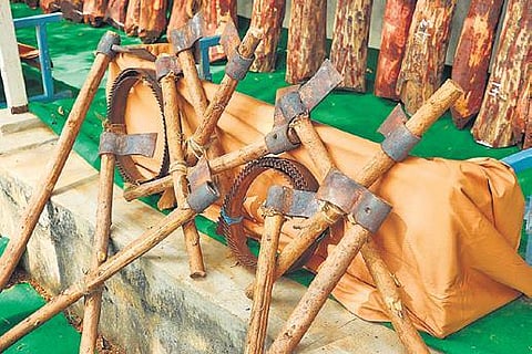 Axes and other material seized from the red sanders smuggling gang in Nellore on Saturday. (Photo | EXPRESS)